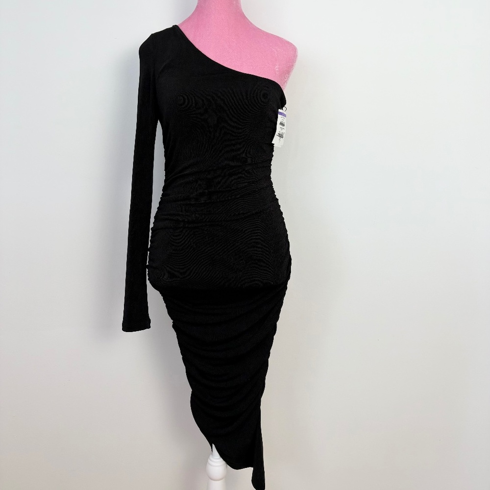 Likely sparkly one shoulder dress